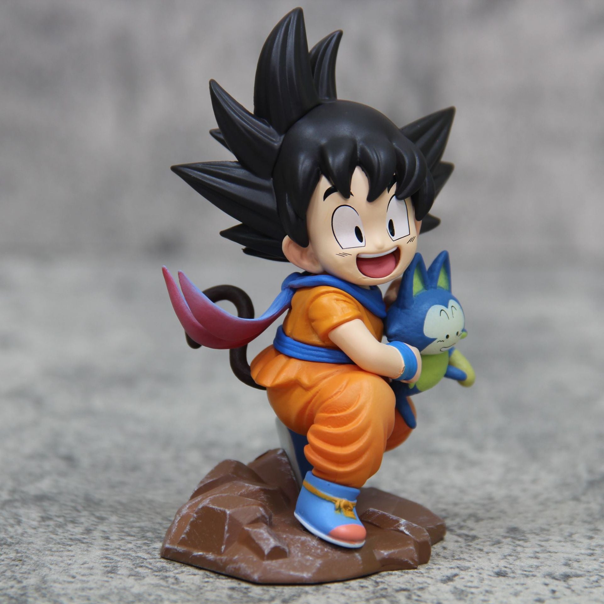 +1 Anime Dragon Ball Chibi Style Young Goku Holding Puar Scene Car Dashboard Ornament Anime Figure Collectible Toy